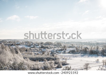 snow covered landscape, small city landscape in winter theme