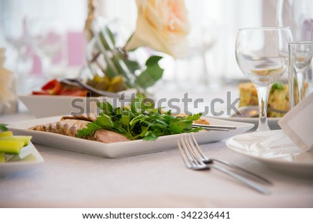 Dish of food. Cold snacks. Serving of food. Table decorations. Menu for a person. Food for anniversaries, weddings and celebrations.