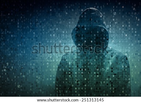 hacker over a screen with binary code