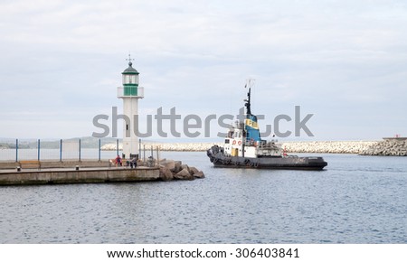 Burgas - June 9: A little boat - leader sail into port on June 9, 2015, Burgas, Bulgaria