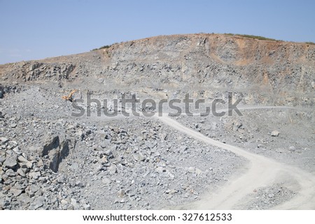 Burgas - August 29: Career for the extraction of stone blocks with excavator construction needs on August 29, 2015 Bourgas, Bulgaria