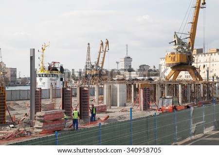 Burgas - October 27: The Port - construction of a new warehouse. Workers with protective clothing on October 27, 2015 Bourgas, Bulgaria