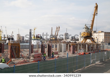 Burgas - October 27: The Port - construction of a new warehouse. Workers with protective clothing on October 27, 2015 Bourgas, Bulgaria
