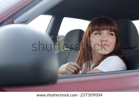 young woman in the car portrait