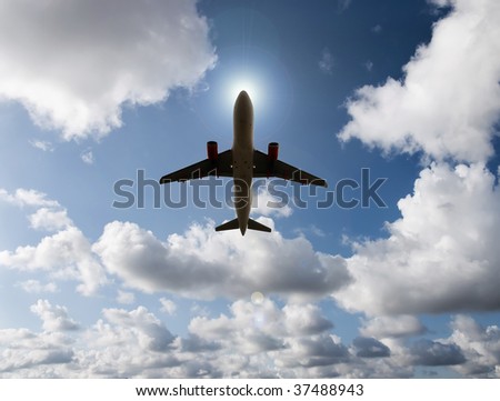 airplane in the sky with clouds and sun