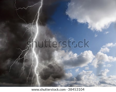 blue sunny sky and black clouds with lightning