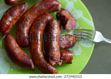 Juicy tasty sausage. Appetizing look. Healthy lifestyle. Nutritious food. Good mood. House food. Golden crust. Beautiful look. Tasty it is also useful.