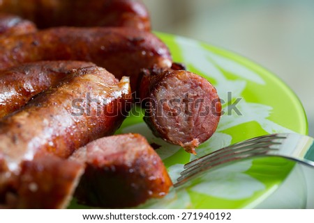 Juicy tasty sausage. Appetizing look. Healthy lifestyle. Nutritious food. Good mood. House food. Golden crust. Beautiful look. Tasty it is also useful.