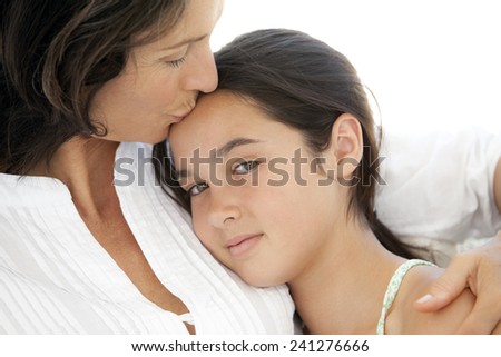 mother comforting her daughter