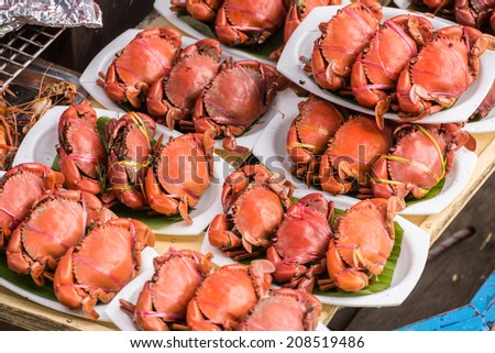 Grilled crabs, one of a famous food of Ampawa floating market, Samut Songkhram, Thailand