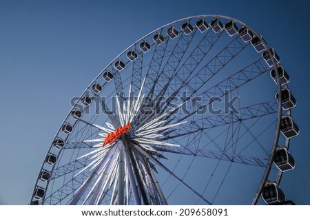BANGKOK -  6 April : Ferris wheel in Asiatique The Riverfront, an expansive open-air mall with river views and  'festival market and living museum' concept. on April 6, 2014 in Bangkok, Thailand