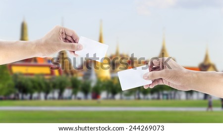 Hand exchanging a card