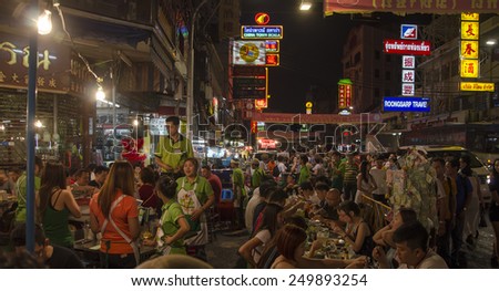 Bangkok, Thailand - 31 January 2015 : People come to shopping at bangkok chinatown on Yaowarat Road,There are many small streets and alleys full of shops and vendors selling all types of goods.