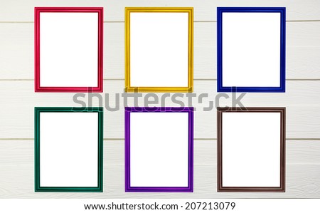 Set of colorful wooden frames on background