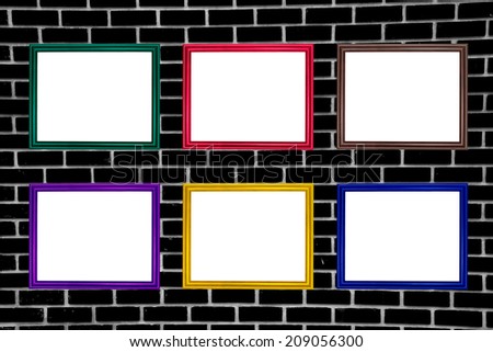 Set of colorful wooden frames on background