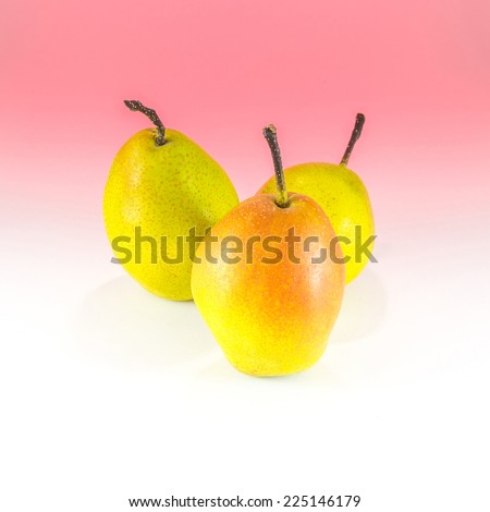 Pear on the white and red  background