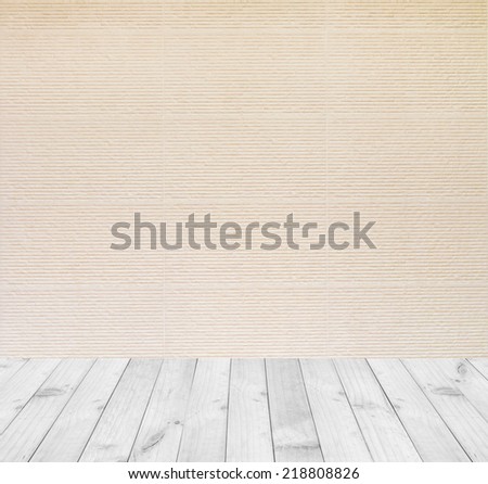 Interior room with linear pattern tiles wall and wooden floor
