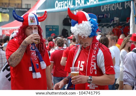 WROCLAW, POLAND - JUNE 8: Unidentified Czech Republic fans with hats in national colors on June 8, 2012 in Wroclaw. The EURO 2012 will be held from June 8 - July 1, 2012 hosted by Poland and Ukraine.