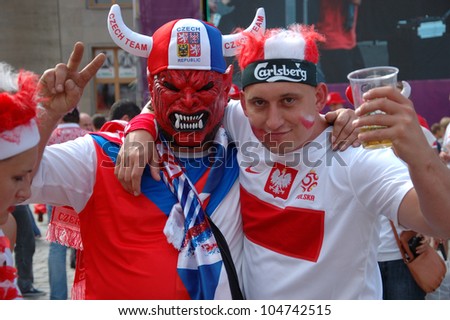 WROCLAW, POLAND - JUNE 8: Unidentified Czech and Pole football fans of Euro 2012 on June 8, 2012 in Wroclaw. The EURO 2012 will be held from June 8 - July 1, 2012 hosted by Poland and Ukraine.