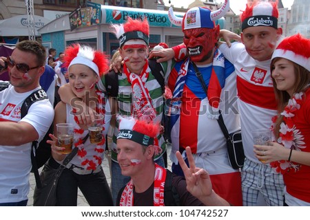 WROCLAW, POLAND - JUNE 8: Unidentified Polish, Czech Euro 2012 fans in Wroclaw fanzone on June 8, 2012 in Wroclaw. The EURO 2012 will be held from June 8 - July 1, 2012 hosted by Poland and Ukraine.