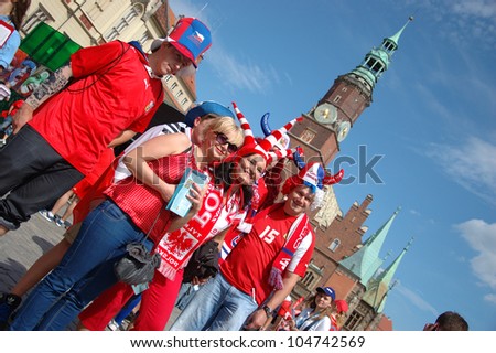 WROCLAW, POLAND - JUNE 8: Unidentified Polish and Czech fans gather in front of Town Hall on June 8, 2012 in Wroclaw. The EURO 2012 will be held from June 8 - July 1, 2012 hosted by Poland and Ukrain