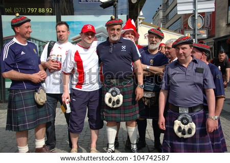WROCLAW, POLAND - JUNE 8: Unidentified Polish and Scottish fans before Euro 2012 on June 8, 2012 in Wroclaw. The EURO 2012 will be held from June 8 - July 1, 2012 hosted by Poland and Ukraine.