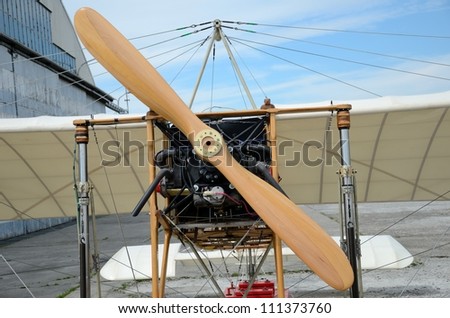 SZYMANOW, POLAND - AUGUST 25: copy of wooden plane Bleriot XI - the first plane which flied over La Manche canal. Replica presented on August 25, 2012 in Szymanow.
