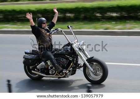 Wroclaw, Poland - May 18: Unidentified Motorcyclist Rides Harley-Davidson Motorcycle During Parade Super Rally On May 18, 2013 In Wroclaw. Around 8,000 Riders Joined This Event From 16 To 20 May 2013.
