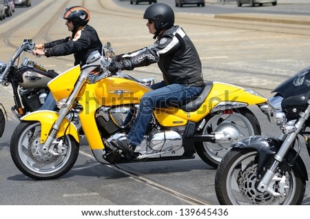 WROCLAW, POLAND - MAY 18: Unidentified group rides Harley-Davidson in city center. Around 8 thousands motorcyclist joined international event Super Rally on 18 May 2013 in Wroclaw, Poland.