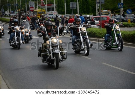 WROCLAW, POLAND - MAY 18: Unidentified group rides Harey-Davidson motors. Around 8 thousands motorcyclist joined international event Super Rally on 18 May 2013 in Wroclaw, Poland.
