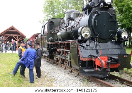 KROSNICE, DOLNY SLASK, POLAND - MAY 25: Restored narrow gauge railroad in Krosnice. Railwaymen prepare for the first run on 25 May 2013 in Krosnice, Poland.