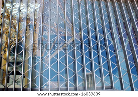 China, Guangdong province, Shenzhen city. Modern library with special design, fully covered with glass panels, inside steel irregular construction.