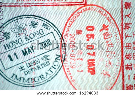 European passport full of stamps from China and Hongkong borders.