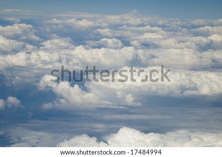 Beautiful blue sky with white clouds covering sky somewhere above China.