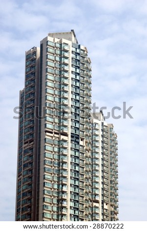 Hongkong SAR, Kowloon, modern, tall residential skyscraper with hundreds of flats.