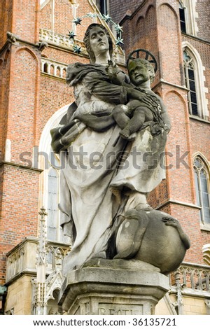 Saint Mary sculpture, Mother holding Jesus in front of Wroclaw\'s Cathedral, Poland.