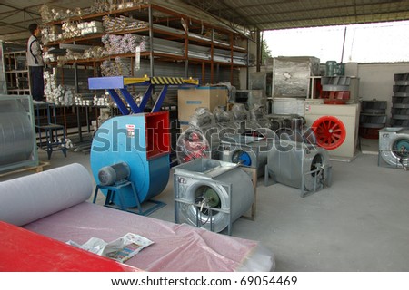 CANTON, CHINA - NOVEMBER 11: One of the biggest manufacturer of auto spray booths and generators in China. Warehouse with components for generators on November 11, 2010 in Canton, China.