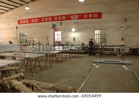 CANTON, CHINA - NOVEMBER 11: One of the biggest manufacturer of auto spray booths and generators in China. Wall panel warehouse on November 11, 2010 in Canton, China.
