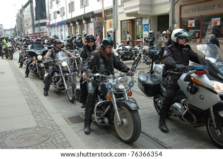 WROCLAW, POLAND - APRIL 16: Unidentified motorcycle riders take part in a motorcycle parade and blood drive for hospitalized children on April 16, 2011 in Wroclaw, Poland.