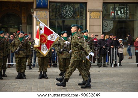 WROCLAW, POLAND - DECEMBER 2: Polish army, engineering training center for troops receives new army banner. Official parade - soldiers present new banner on December 2, 2011. Wroclaw