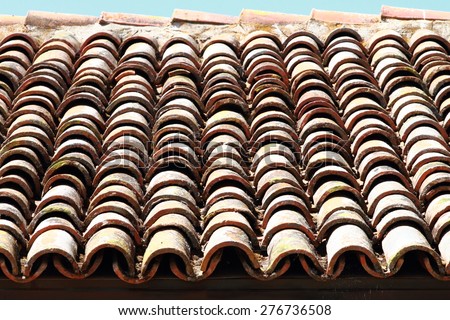 Red tiles roof background. Background of old roof tiles.