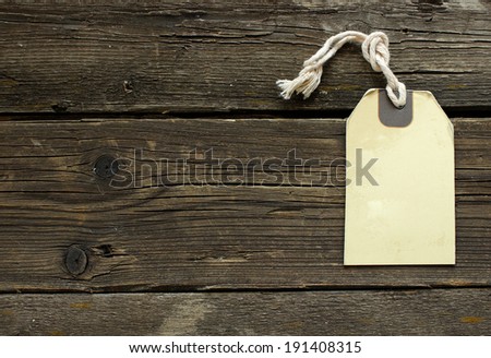 Blank vintage label on old wooden boards.