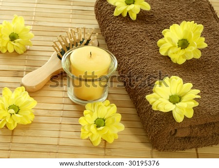 Spa background. towel, flowers and candle