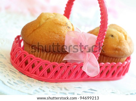 muffins in pink basket