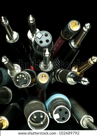 heap of various audio cables closeup, for audio,wiring or sound themes