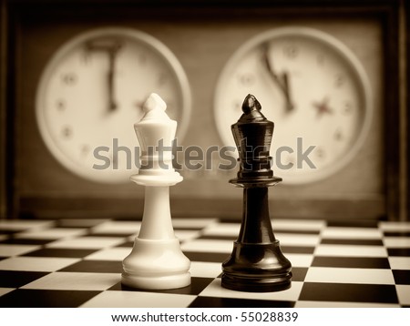 White and black king on the chessboard opposing each other,old chess clock in the background,sepia toned,can be used as concept for conflict,meeting,agreement..