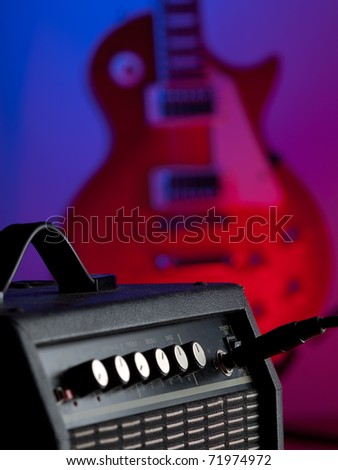 guitar amplifier with the electric guitar in the background,for entertainment and music themes