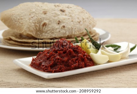 Garlic and chilly chutney with Roti, Indian food