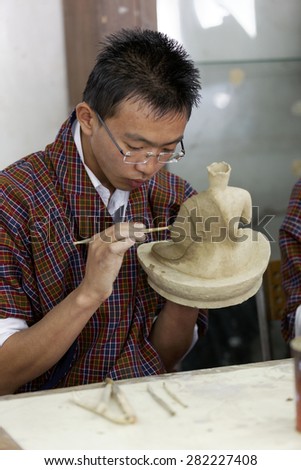 Students learning sculpture making in art and crafts institute, THIMPU, BHUTAN, May 2015