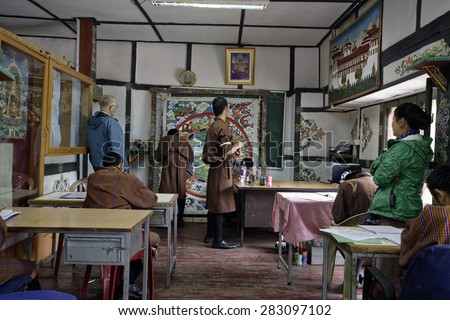 Students learning painting technique at arts and crafts school Thimpu, BHUTAN, Circa May 2015